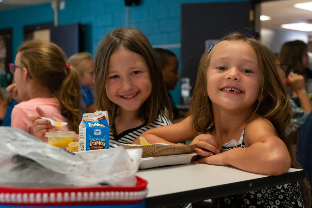 Two students posing at lunch